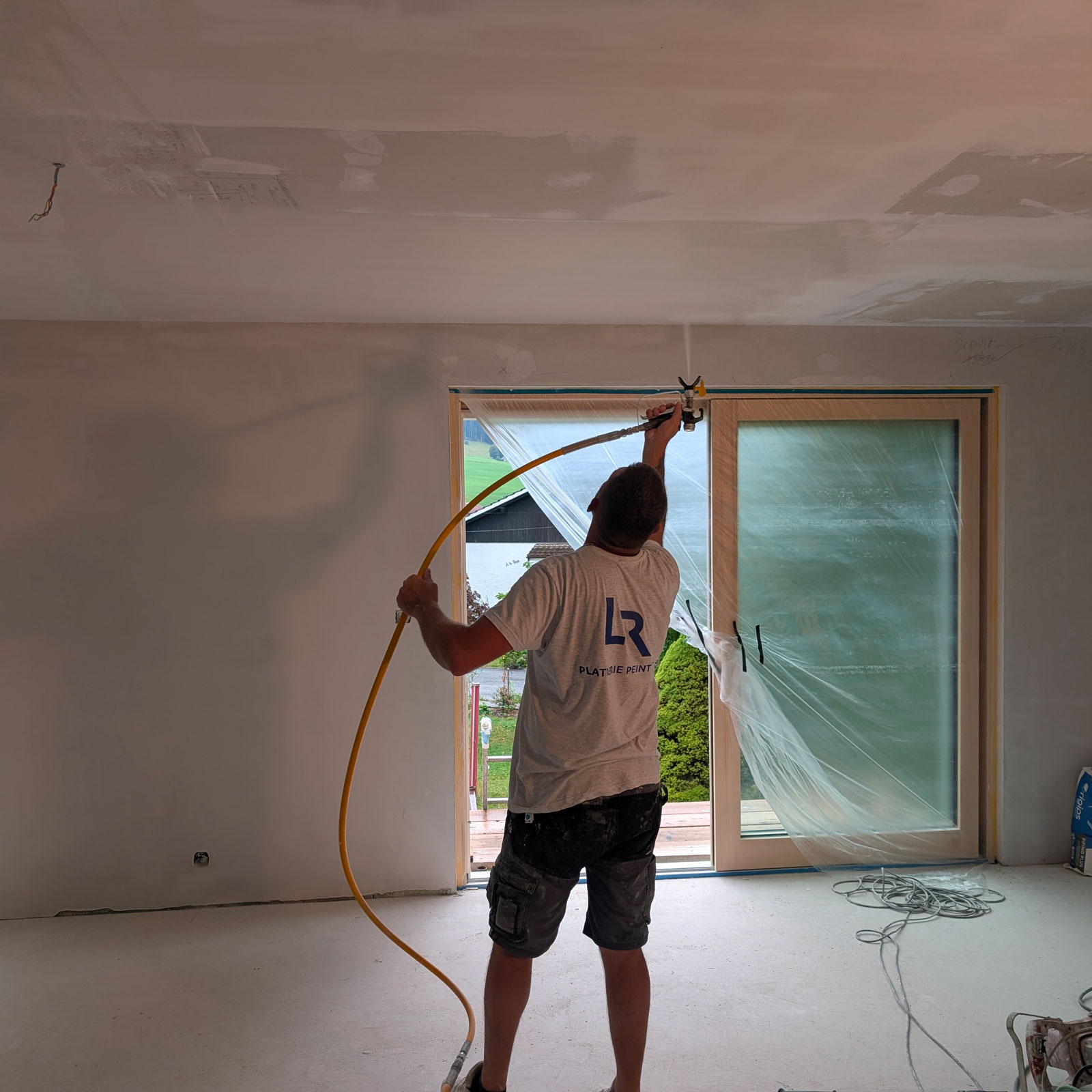 Giclage et lissage d'enduit Façade isolation en polystyrène - 04